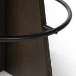 Featuring Damon Sapphire Khaki  Swivel Bar + Counter Stool by Four Hands at Amethyst Home. Large angular panels merge to form a geometrically inspired base in this modern counter stool. The circle metal ring around the base serves as a footrest, while the round upholstered cushion provides comfortable seating. The 360-degree swivel function adds versatilit. Amethyst Home provides interior design, new home construction design consulting, vintage area rugs, and lighting in the Washington metro area.