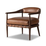 Featuring Dane Sonoma Chestnut Chair by Four Hands at Amethyst Home. Safari styling is brought to modern speed on this vintage-inspired chair. Its solid wood frame features a webbed seating structure that brings a sink-in feel to the entire piece. The upholstered back, strap details and loose cushion are finished in carbon neutral, vegetable-tanned leather . Amethyst Home provides interior design, new home construction design consulting, vintage area rugs, and lighting in the Calabasas metro area.