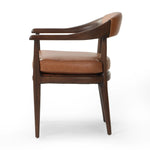 Featuring Dane Sonoma Chestnut Dining Chair by Four Hands at Amethyst Home. Indulge in the refined elegance of the Dane Sonoma Chestnut Dining Chair. With its classic design and luxurious chestnut finish, this dining chair is the perfect addition to any upscale dining room. Its sturdy construction ensures both style and comfort, making every meal a lavish exp. Amethyst Home provides interior design, new home construction design consulting, vintage area rugs, and lighting in the Houston metro area.