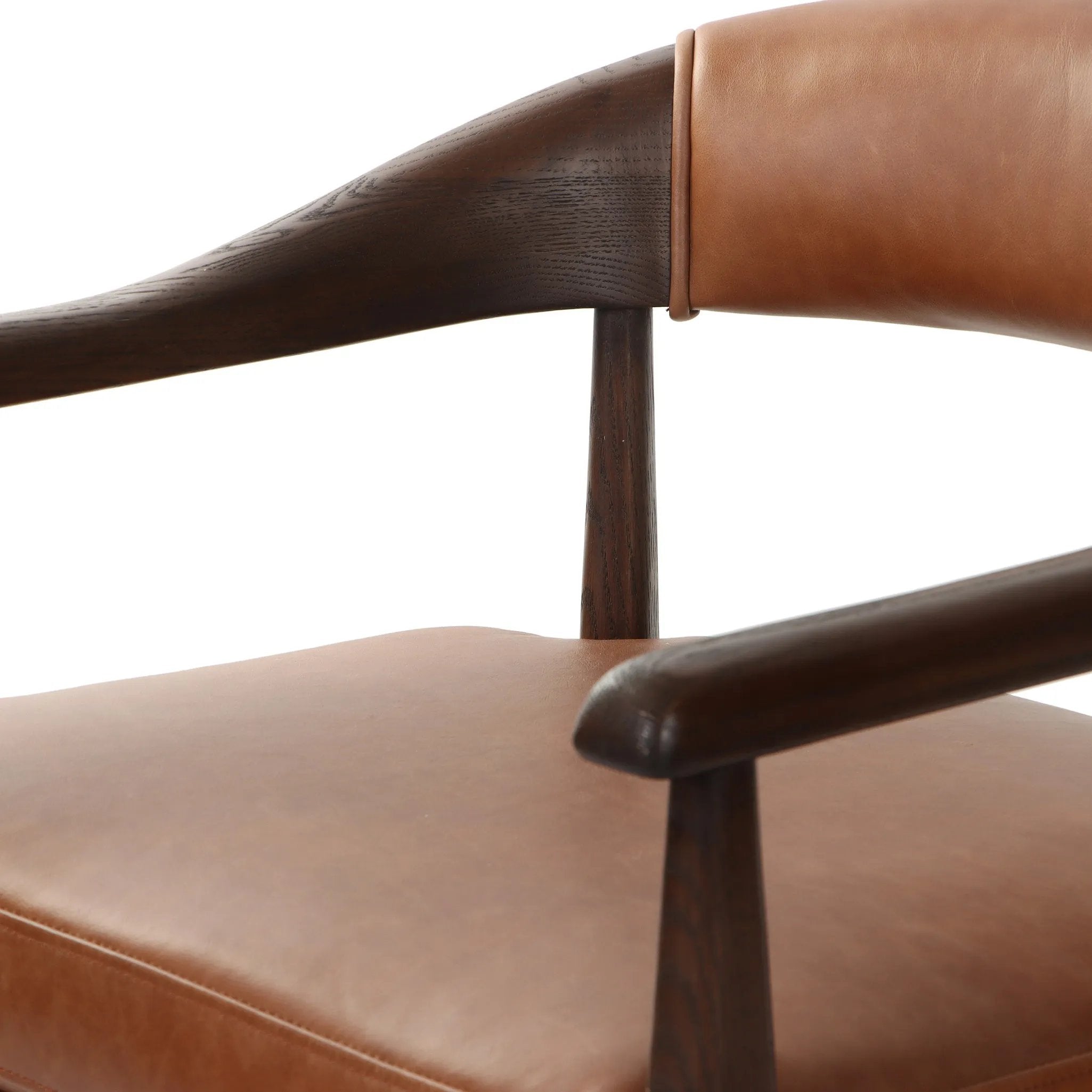 Featuring Dane Sonoma Chestnut Dining Chair by Four Hands at Amethyst Home. Indulge in the refined elegance of the Dane Sonoma Chestnut Dining Chair. With its classic design and luxurious chestnut finish, this dining chair is the perfect addition to any upscale dining room. Its sturdy construction ensures both style and comfort, making every meal a lavish. Amethyst Home provides interior design, new home construction design consulting, vintage area rugs, and lighting in the Kansas City metro area.