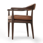 Featuring Dane Sonoma Chestnut Dining Chair by Four Hands at Amethyst Home. Indulge in the refined elegance of the Dane Sonoma Chestnut Dining Chair. With its classic design and luxurious chestnut finish, this dining chair is the perfect addition to any upscale dining room. Its sturdy construction ensures both style and comfort, making every meal a lavish exper. Amethyst Home provides interior design, new home construction design consulting, vintage area rugs, and lighting in the Miami metro area.