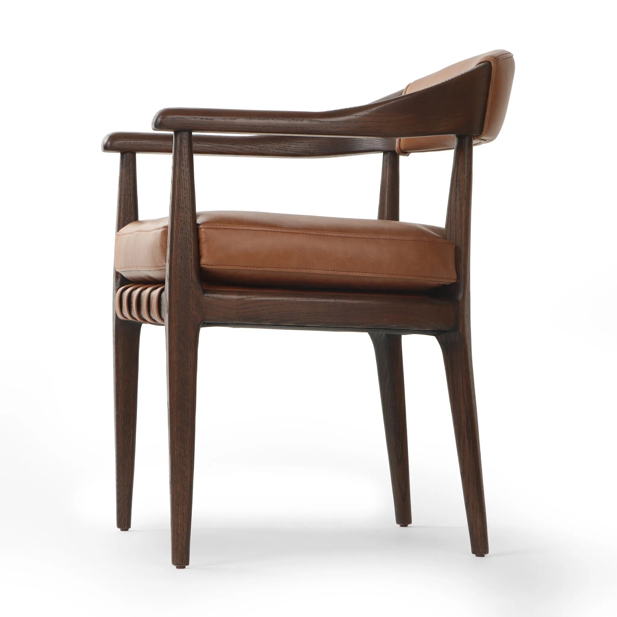 Featuring Dane Sonoma Chestnut Dining Chair by Four Hands at Amethyst Home. Indulge in the refined elegance of the Dane Sonoma Chestnut Dining Chair. With its classic design and luxurious chestnut finish, this dining chair is the perfect addition to any upscale dining room. Its sturdy construction ensures both style and comfort, making every meal a lavish exper. Amethyst Home provides interior design, new home construction design consulting, vintage area rugs, and lighting in the Miami metro area.