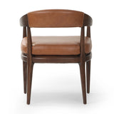 Featuring Dane Sonoma Chestnut Dining Chair by Four Hands at Amethyst Home. Indulge in the refined elegance of the Dane Sonoma Chestnut Dining Chair. With its classic design and luxurious chestnut finish, this dining chair is the perfect addition to any upscale dining room. Its sturdy construction ensures both style and comfort, making every meal a lav. Amethyst Home provides interior design, new home construction design consulting, vintage area rugs, and lighting in the Salt Lake City metro area.