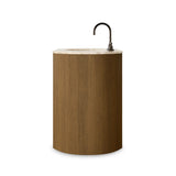 Sleek and softly curved, this pill-shaped bath vanity pairs a monochromatic base with a natural marble top. Complemented by rounded hardware and a set back base board, with adjustable and removable shelves inside for ample storage. Finished with a bath-safe sealant for moisture resistance. Amethyst Home provides interior design, new home construction design consulting, vintage area rugs, and lighting in the Portland metro area.