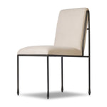 European inspiration gives streamlined character to this high-back metal-framed dining chair. Bent metal detail and tapered feet add interesting elements. Supported with upholstered seating in snow-white Crypton® performance fabric. Crypton® fabric is specially engineered for protection against stains, moisture and odor Amethyst Home provides interior design, new home construction design consulting, vintage area rugs, and lighting in the Houston metro area.