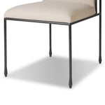 European inspiration gives streamlined character to this high-back metal-framed dining chair. Bent metal detail and tapered feet add interesting elements. Supported with upholstered seating in snow-white Crypton® performance fabric. Crypton® fabric is specially engineered for protection against stains, moisture and odor Amethyst Home provides interior design, new home construction design consulting, vintage area rugs, and lighting in the Nashville metro area.