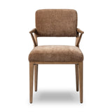 Pastoral inspiration defines a thoughtfully designed dining chair of toasted oak, while soft earthen upholstery covers a comfortable seat and back Amethyst Home provides interior design, new home construction design consulting, vintage area rugs, and lighting in the Calabasas metro area.