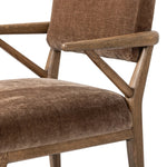 Pastoral inspiration defines a thoughtfully designed dining chair of toasted oak, while soft earthen upholstery covers a comfortable seat and back Amethyst Home provides interior design, new home construction design consulting, vintage area rugs, and lighting in the Des Moines metro area.