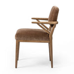 Pastoral inspiration defines a thoughtfully designed dining chair of toasted oak, while soft earthen upholstery covers a comfortable seat and back Amethyst Home provides interior design, new home construction design consulting, vintage area rugs, and lighting in the Houston metro area.