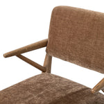 Pastoral inspiration defines a thoughtfully designed dining chair of toasted oak, while soft earthen upholstery covers a comfortable seat and back Amethyst Home provides interior design, new home construction design consulting, vintage area rugs, and lighting in the Nashville metro area.