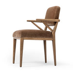 Pastoral inspiration defines a thoughtfully designed dining chair of toasted oak, while soft earthen upholstery covers a comfortable seat and back Amethyst Home provides interior design, new home construction design consulting, vintage area rugs, and lighting in the San Diego metro area.