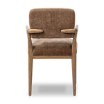 Pastoral inspiration defines a thoughtfully designed dining chair of toasted oak, while soft earthen upholstery covers a comfortable seat and back Amethyst Home provides interior design, new home construction design consulting, vintage area rugs, and lighting in the Scottsdale metro area.