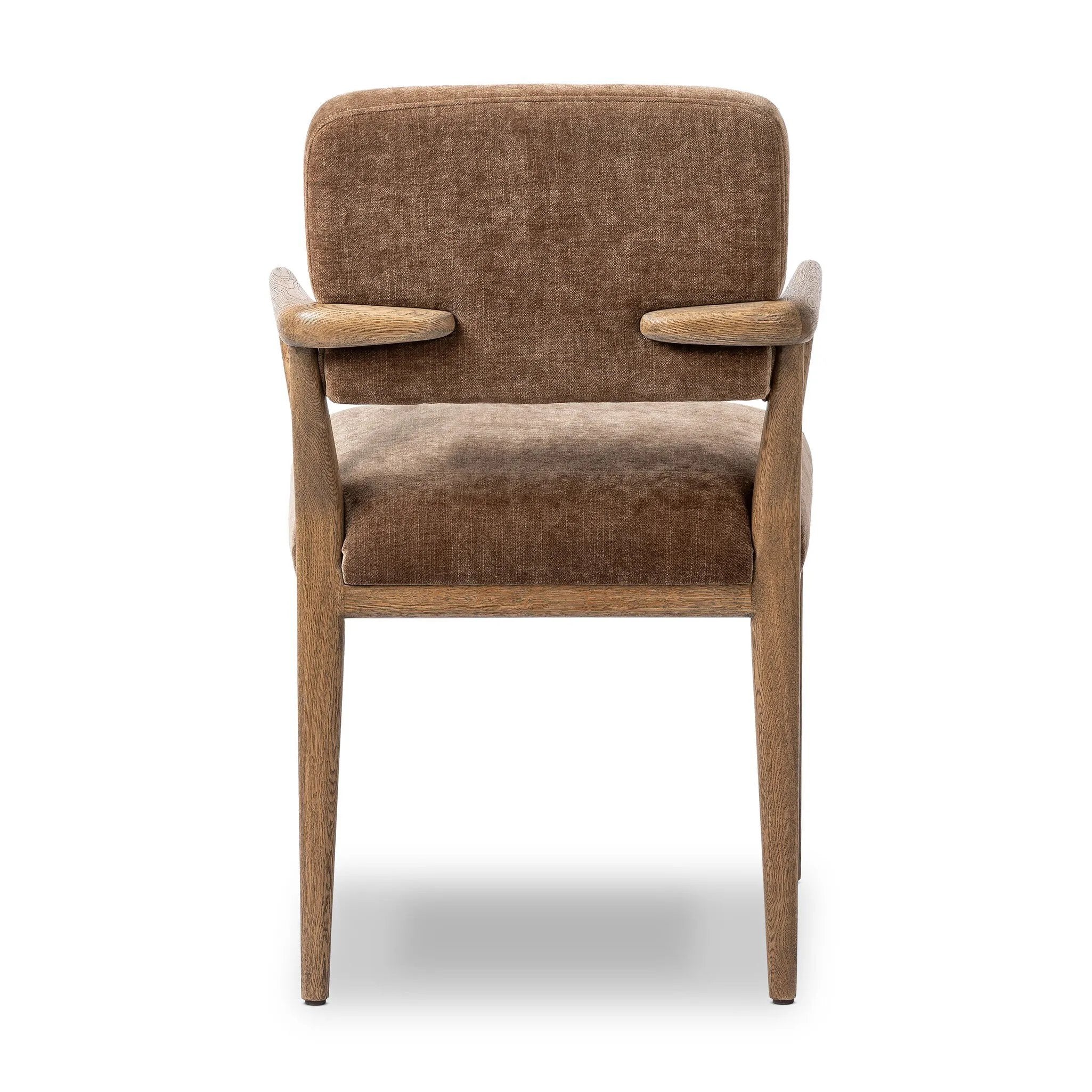 Pastoral inspiration defines a thoughtfully designed dining chair of toasted oak, while soft earthen upholstery covers a comfortable seat and back Amethyst Home provides interior design, new home construction design consulting, vintage area rugs, and lighting in the Scottsdale metro area.