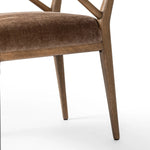 Pastoral inspiration defines a thoughtfully designed dining chair of toasted oak, while soft earthen upholstery covers a comfortable seat and back Amethyst Home provides interior design, new home construction design consulting, vintage area rugs, and lighting in the Seattle metro area.