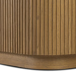 Crafted from desert oak solids and veneers with a plinth-style base, rounded sides and linear reeding, this sideboard exudes midcentury vibes.  Fully finished interior and shelves for quality detailing inside and out Amethyst Home provides interior design, new home construction design consulting, vintage area rugs, and lighting in the Kansas City metro area.