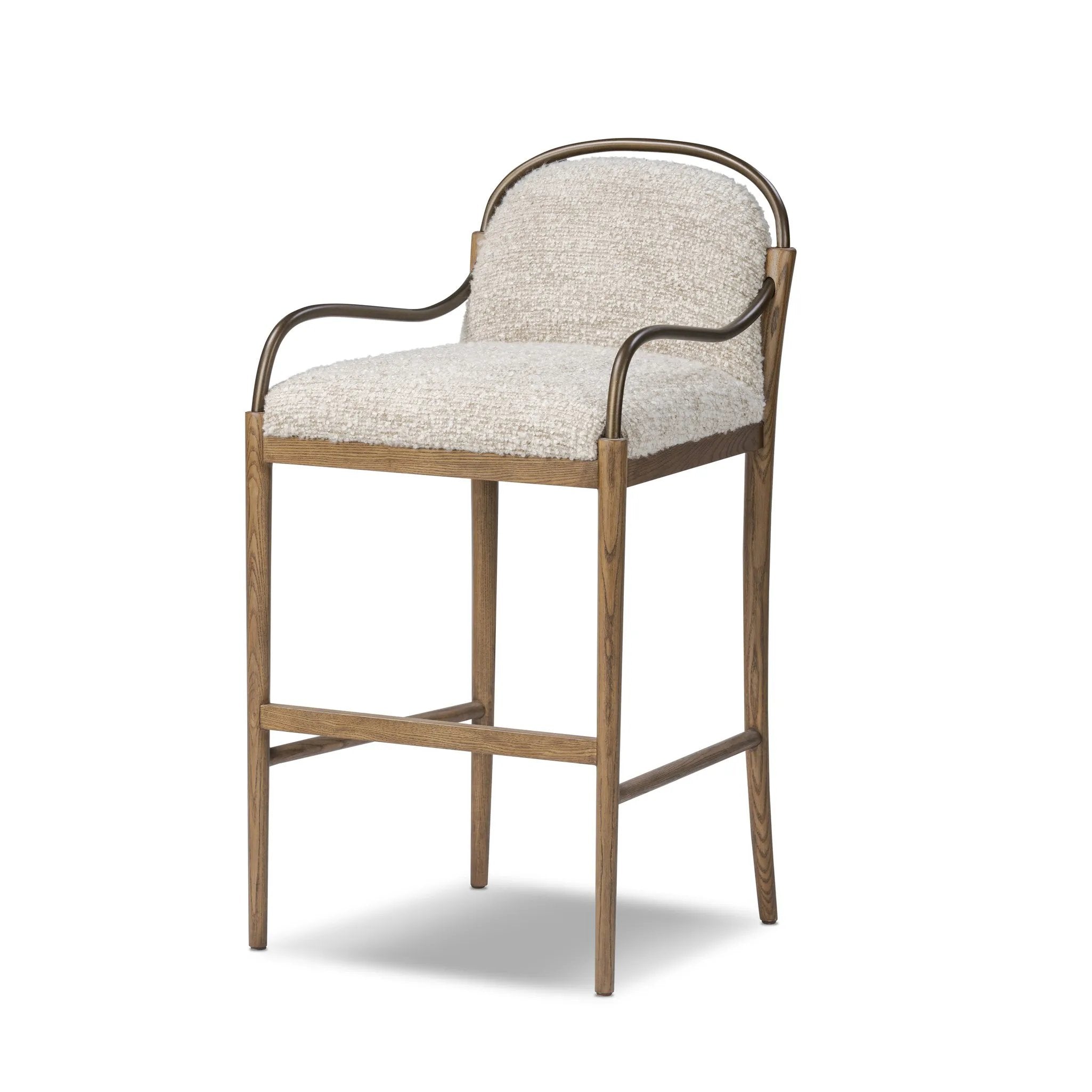 A tribute to traditional artistry and found pieces, this bar stool fluidly combines ash and burnished brass to frame a comfortable S-spring seat. Finished in heavy boucle-like upholstery that features a subtle linear pattern for added depth — creating a luxe, inviting feel. A design collaboration by Amber Lewis and Four Hands. Amethyst Home provides interior design, new home construction design consulting, vintage area rugs, and lighting in the Austin metro area.