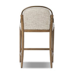 A tribute to traditional artistry and found pieces, this bar stool fluidly combines ash and burnished brass to frame a comfortable S-spring seat. Finished in heavy boucle-like upholstery that features a subtle linear pattern for added depth — creating a luxe, inviting feel. A design collaboration by Amber Lewis and Four Hands. Amethyst Home provides interior design, new home construction design consulting, vintage area rugs, and lighting in the Newport Beach metro area.
