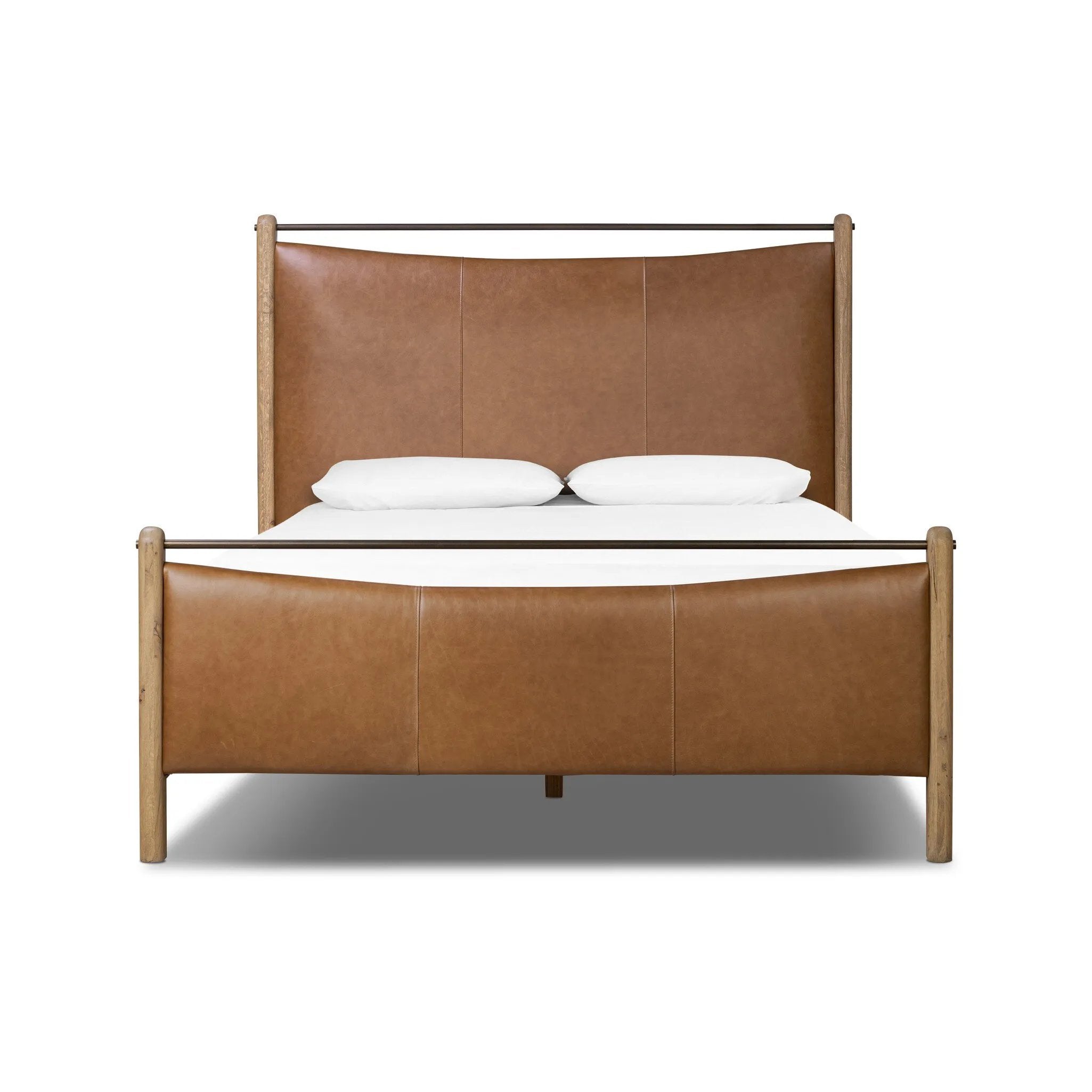 Slightly scooped top-grain leather tufting is bridged with metal bars in brushed brass for modern detailing. Aged smoked oak frames the three-paneled headboard and footboard wrapped in chestnut top-grain leather. Rounded legs soften the look Amethyst Home provides interior design, new home construction design consulting, vintage area rugs, and lighting in the Des Moines metro area.