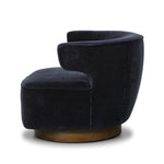 The continuous form of this swivel chair creates a sleek look that elevates everyday seating. Upholstered in navy wool blend, its sleek design is complemented by a 360-degree swivel and pedestal base of solid parawood for a mixed media moment Amethyst Home provides interior design, new home construction design consulting, vintage area rugs, and lighting in the Austin metro area.