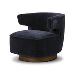 The continuous form of this swivel chair creates a sleek look that elevates everyday seating. Upholstered in navy wool blend, its sleek design is complemented by a 360-degree swivel and pedestal base of solid parawood for a mixed media moment Amethyst Home provides interior design, new home construction design consulting, vintage area rugs, and lighting in the Calabasas metro area.