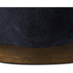 The continuous form of this swivel chair creates a sleek look that elevates everyday seating. Upholstered in navy wool blend, its sleek design is complemented by a 360-degree swivel and pedestal base of solid parawood for a mixed media moment Amethyst Home provides interior design, new home construction design consulting, vintage area rugs, and lighting in the Houston metro area.