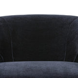 The continuous form of this swivel chair creates a sleek look that elevates everyday seating. Upholstered in navy wool blend, its sleek design is complemented by a 360-degree swivel and pedestal base of solid parawood for a mixed media moment Amethyst Home provides interior design, new home construction design consulting, vintage area rugs, and lighting in the Los Angeles metro area.