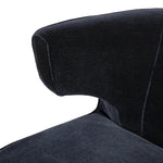 The continuous form of this swivel chair creates a sleek look that elevates everyday seating. Upholstered in navy wool blend, its sleek design is complemented by a 360-degree swivel and pedestal base of solid parawood for a mixed media moment Amethyst Home provides interior design, new home construction design consulting, vintage area rugs, and lighting in the Miami metro area.