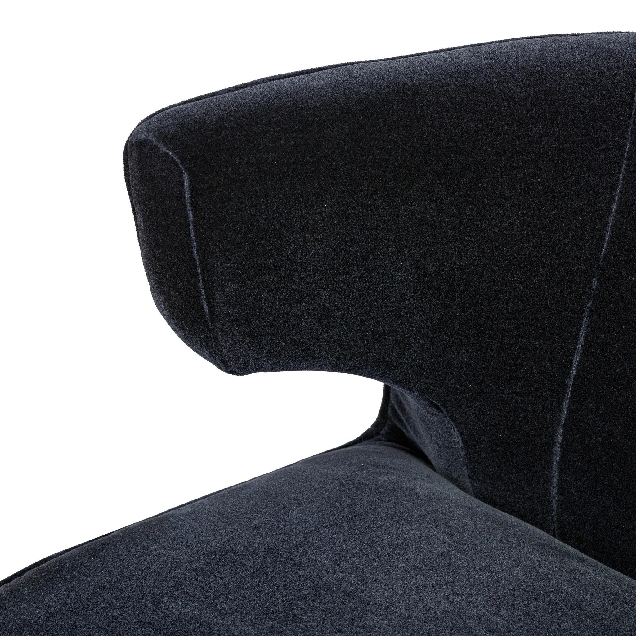 The continuous form of this swivel chair creates a sleek look that elevates everyday seating. Upholstered in navy wool blend, its sleek design is complemented by a 360-degree swivel and pedestal base of solid parawood for a mixed media moment Amethyst Home provides interior design, new home construction design consulting, vintage area rugs, and lighting in the Miami metro area.