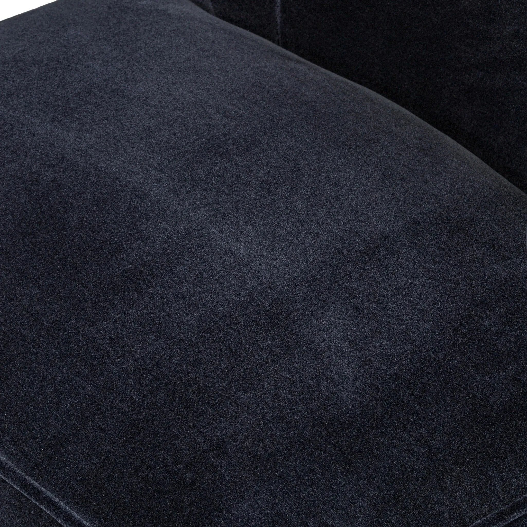 The continuous form of this swivel chair creates a sleek look that elevates everyday seating. Upholstered in navy wool blend, its sleek design is complemented by a 360-degree swivel and pedestal base of solid parawood for a mixed media moment Amethyst Home provides interior design, new home construction design consulting, vintage area rugs, and lighting in the Newport Beach metro area.