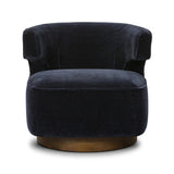 The continuous form of this swivel chair creates a sleek look that elevates everyday seating. Upholstered in navy wool blend, its sleek design is complemented by a 360-degree swivel and pedestal base of solid parawood for a mixed media moment Amethyst Home provides interior design, new home construction design consulting, vintage area rugs, and lighting in the Portland metro area.