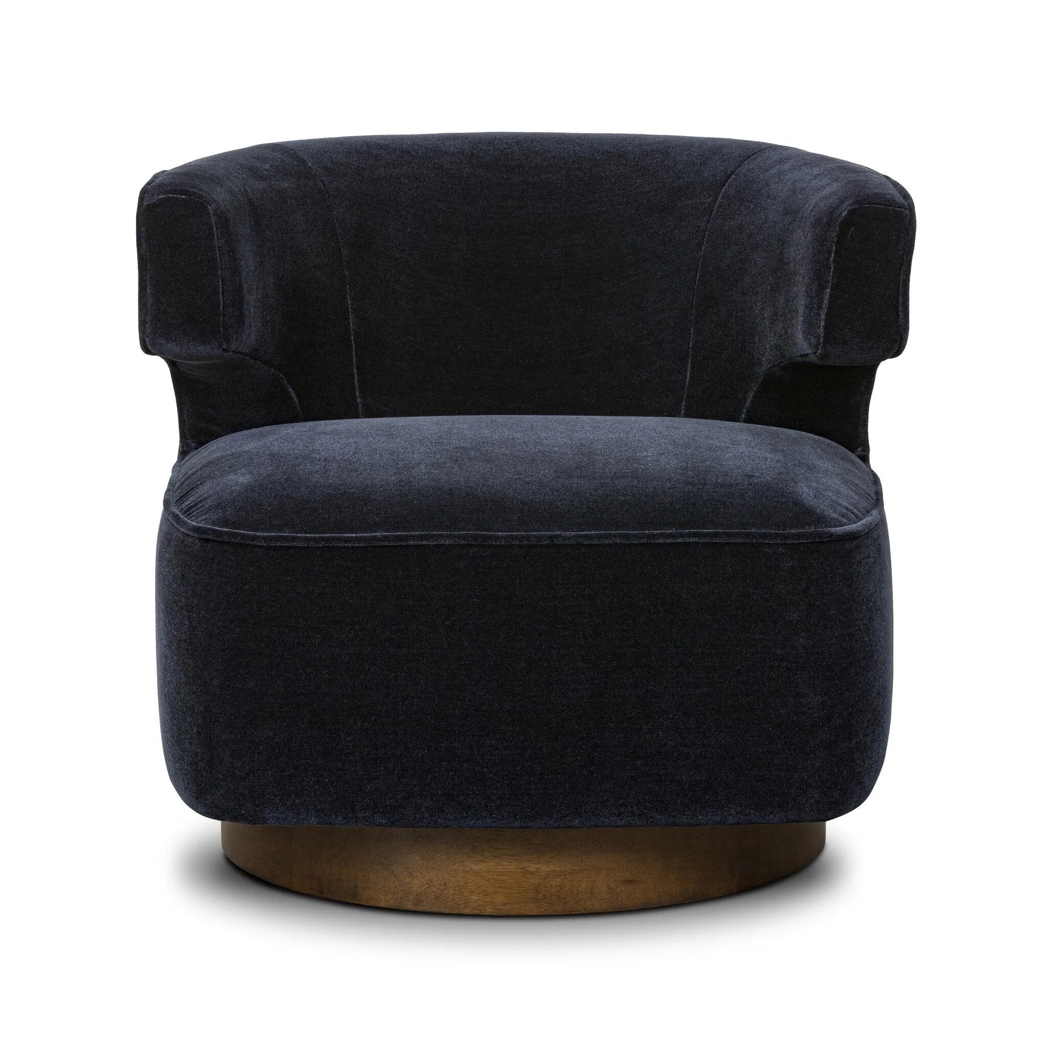 The continuous form of this swivel chair creates a sleek look that elevates everyday seating. Upholstered in navy wool blend, its sleek design is complemented by a 360-degree swivel and pedestal base of solid parawood for a mixed media moment Amethyst Home provides interior design, new home construction design consulting, vintage area rugs, and lighting in the Portland metro area.