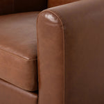 The popular Art Deco club chair makes a comeback. With a prominent curved top, deep seat with a loose cushion, and armrests designed for true relaxation, the armchair invites you to sit back and take it all in. Upholstered in rich mahogany top-grain leather. Amethyst Home provides interior design, new home construction design consulting, vintage area rugs, and lighting in the Seattle metro area.