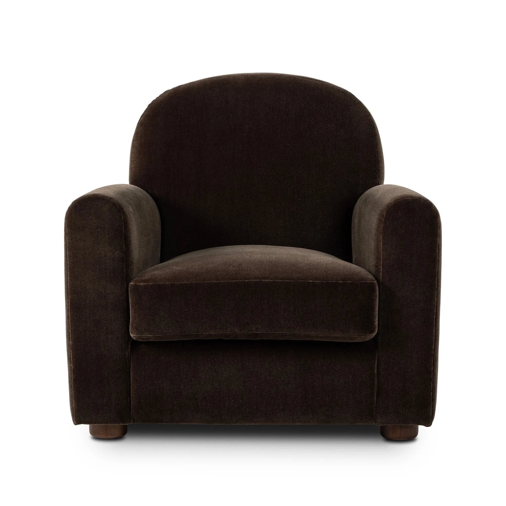 The popular Art Deco club chair makes a comeback. With a prominent curved top, deep seat with a loose cushion, and armrests designed for true relaxation, the armchair invites you to sit back and take it all in. Upholstered in rich chocolate upholstery.As fans of luxe materials at Amethyst, we love the nature inspired Draper Chair - Monte Chocolate. Amethyst Home provides interior design, new home construction design consulting, vintage area rugs, and lighting in the Laguna Beach metro area.