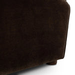 The popular Art Deco club chair makes a comeback. With a prominent curved top, deep seat with a loose cushion, and armrests designed for true relaxation, the armchair invites you to sit back and take it all in. Upholstered in rich chocolate upholstery.As fans of luxe materials at Amethyst, we love the nature inspired Draper Chair - Monte Chocolate. Amethyst Home provides interior design, new home construction design consulting, vintage area rugs, and lighting in the Scottsdale metro area.