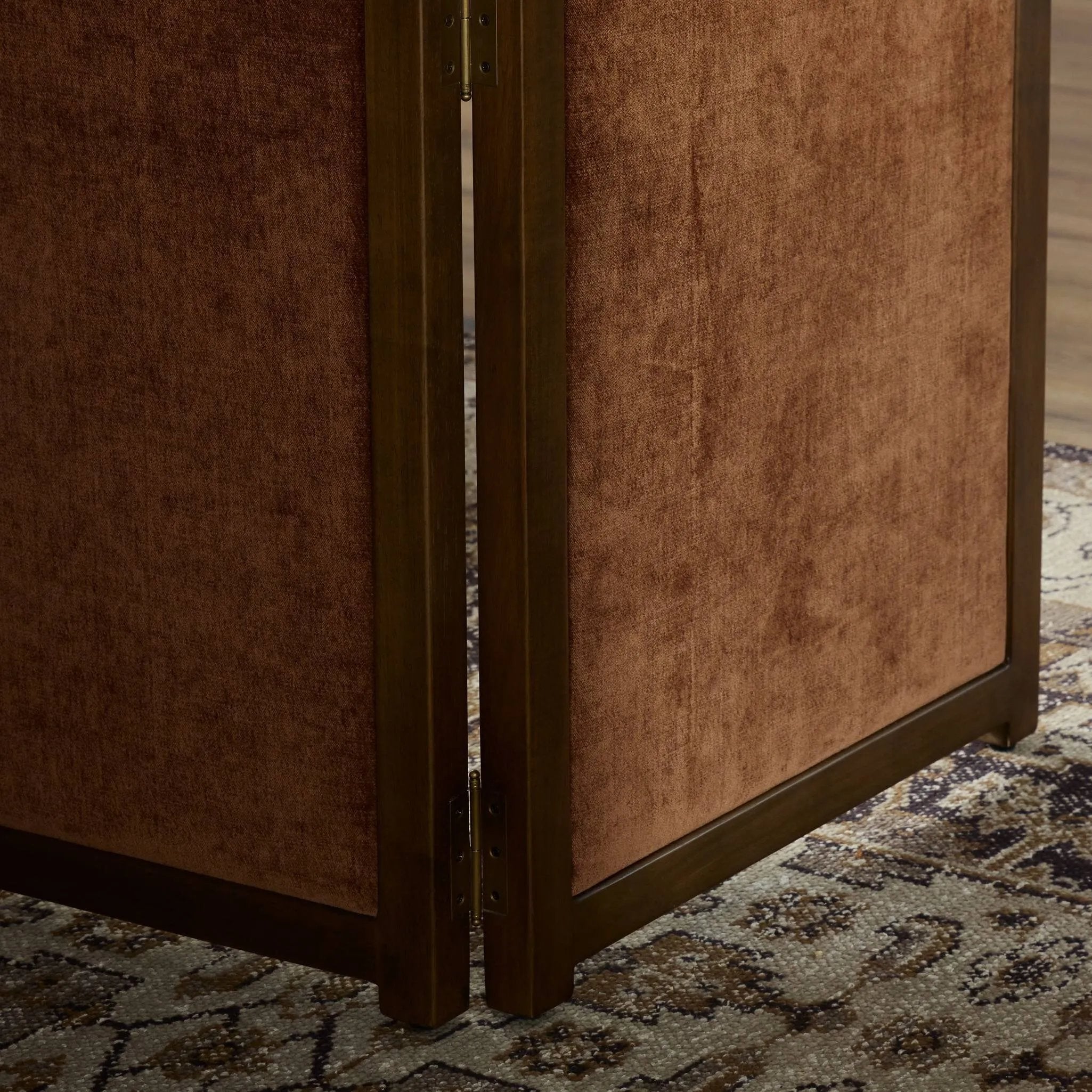 Add privacy where you need it with a vintage-inspired room divider. Three long panels are upholstered in a rich rust-colored chenille and framed out by warm parawood Amethyst Home provides interior design, new home construction design consulting, vintage area rugs, and lighting in the Alpharetta metro area.
