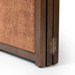 Add privacy where you need it with a vintage-inspired room divider. Three long panels are upholstered in a rich rust-colored chenille and framed out by warm parawood Amethyst Home provides interior design, new home construction design consulting, vintage area rugs, and lighting in the Houston metro area.