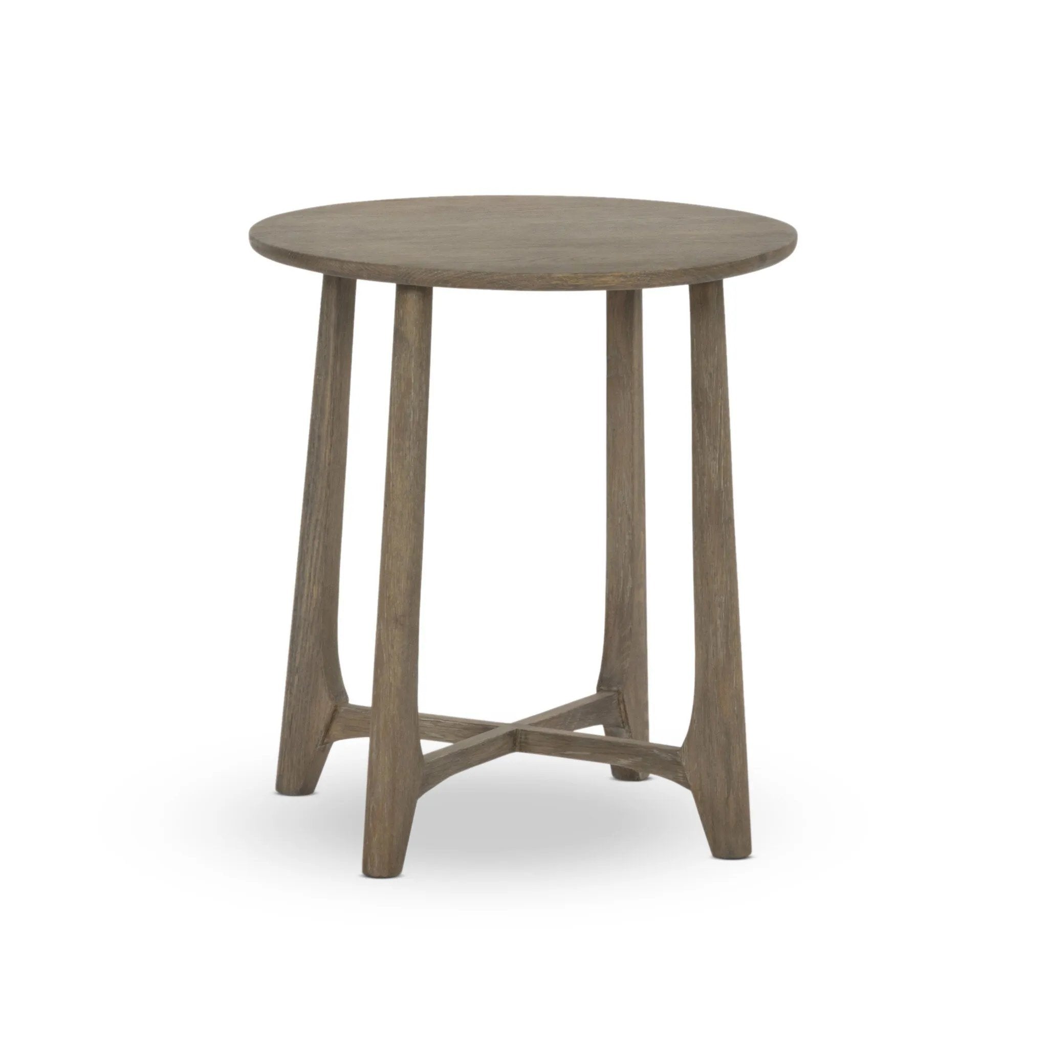 A simple oak table with a warm, light finish features subtle leg details for an artisan touch. Perfectly sized to keep your favorite book or drink within reach, in any space or style Amethyst Home provides interior design, new home construction design consulting, vintage area rugs, and lighting in the Omaha metro area.