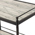Bring a touch of heritage charm to your bedroom with this two-tier metal nightstand. An aged rust finish complements solid marble shelves with stripe-like veining, finished out with turned legs and gallery edging Amethyst Home provides interior design, new home construction design consulting, vintage area rugs, and lighting in the Charlotte metro area.