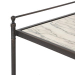 Bring a touch of heritage charm to your bedroom with this two-tier metal nightstand. An aged rust finish complements solid marble shelves with stripe-like veining, finished out with turned legs and gallery edging Amethyst Home provides interior design, new home construction design consulting, vintage area rugs, and lighting in the Portland metro area.