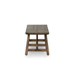 This Wabi Sabi-inspired accent bench feels like a family heirloom, thanks to the timeless look of burnt bleached oak. A trellis base, wide planked top and natural cracks and graining reflect the artisanship behind this special found-feeling pieces Amethyst Home provides interior design, new home construction design consulting, vintage area rugs, and lighting in the Houston metro area.