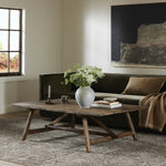 Featuring Elio Burnt Bleached Oak Small Coffee Table by Four Hands at Amethyst Home. Center your living space with a Wabi Sabi-inspired coffee table. Crafted from burnt bleached oak with a trellis base and wide plank top, this artisanal piece embraces the natural cracks and graining reflective of organic materials to bring a beautiful, character-rich look to yo. Amethyst Home provides interior design, new home construction design consulting, vintage area rugs, and lighting in the Miami metro area.