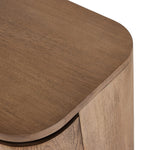 A clean-styled media console made from warm, grain-rich oak. Six doors feature subtle finger grooves for easy open. Gentle curves soften up the look, while a floating design keeps things feeling light and fresh. Inside, generous shelving awaits storage of media and more. Amethyst Home provides interior design, new home construction design consulting, vintage area rugs, and lighting in the Houston metro area.