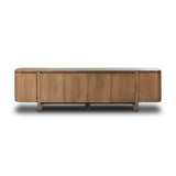A clean-styled media console made from warm, grain-rich oak. Six doors feature subtle finger grooves for easy open. Gentle curves soften up the look, while a floating design keeps things feeling light and fresh. Inside, generous shelving awaits storage of media and more. Amethyst Home provides interior design, new home construction design consulting, vintage area rugs, and lighting in the Salt Lake City metro area.