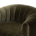Featuring Elliana Surrey Olive Swivel Chair by Four Hands at Amethyst Home. Meet the chair that offers it all: curves, color, texture, durability, and sustainability. All atop a modern 360-degree swivel. Easy to clean and made from fully recyclable materials, FIQA fabrics are machine-washable, stain-resistant, water-repellent and antimicrobial.Overall Dimen. Amethyst Home provides interior design, new home construction design consulting, vintage area rugs, and lighting in the Charlotte metro area.
