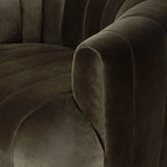 Featuring Elliana Surrey Olive Swivel Chair by Four Hands at Amethyst Home. Meet the chair that offers it all: curves, color, texture, durability, and sustainability. All atop a modern 360-degree swivel. Easy to clean and made from fully recyclable materials, FIQA fabrics are machine-washable, stain-resistant, water-repellent and antimicrobial.Overall Dim. Amethyst Home provides interior design, new home construction design consulting, vintage area rugs, and lighting in the Kansas City metro area.