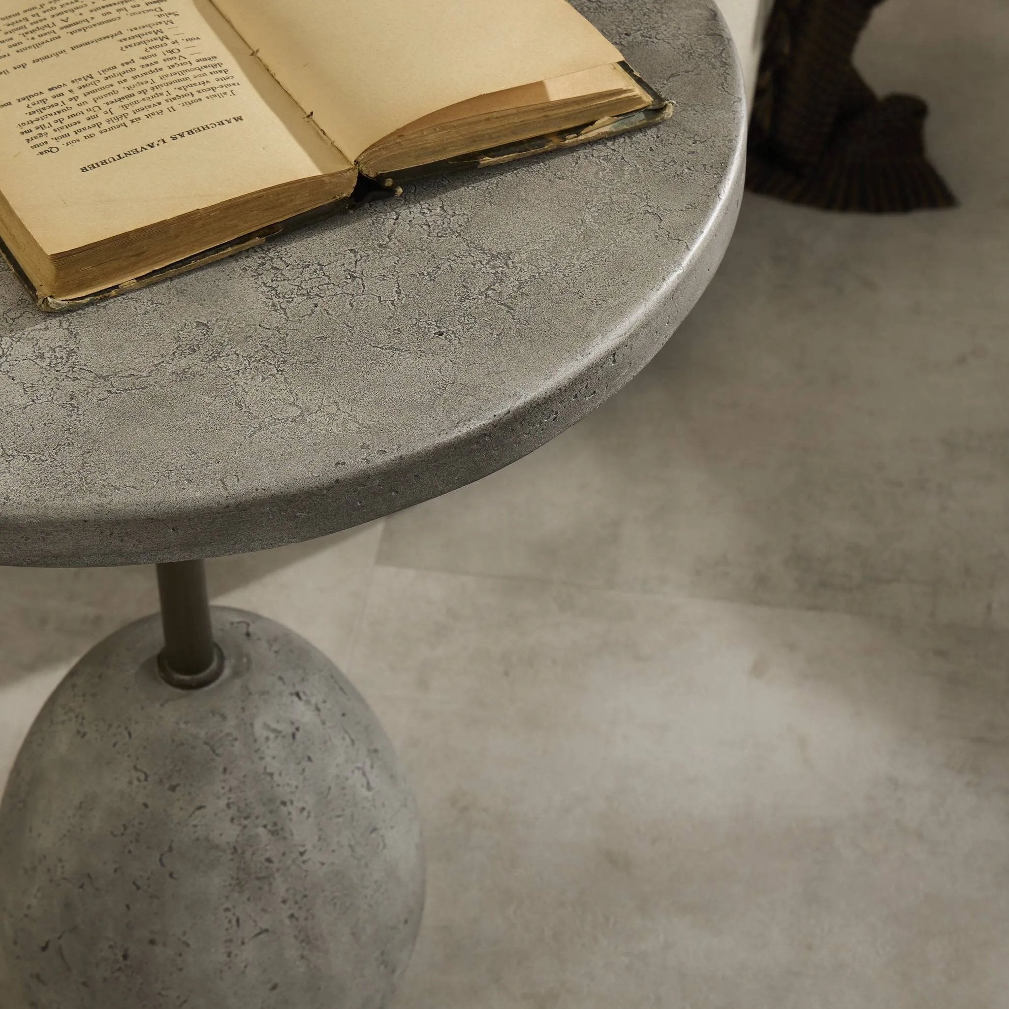 A minimalist end table just made outdoor entertaining easier. Made from solid concrete with an aged smoked finish and sized to be styled seamlessly just about anywhere. Cover or store indoors during inclement weather and when not in use Amethyst Home provides interior design, new home construction design consulting, vintage area rugs, and lighting in the Park City metro area.