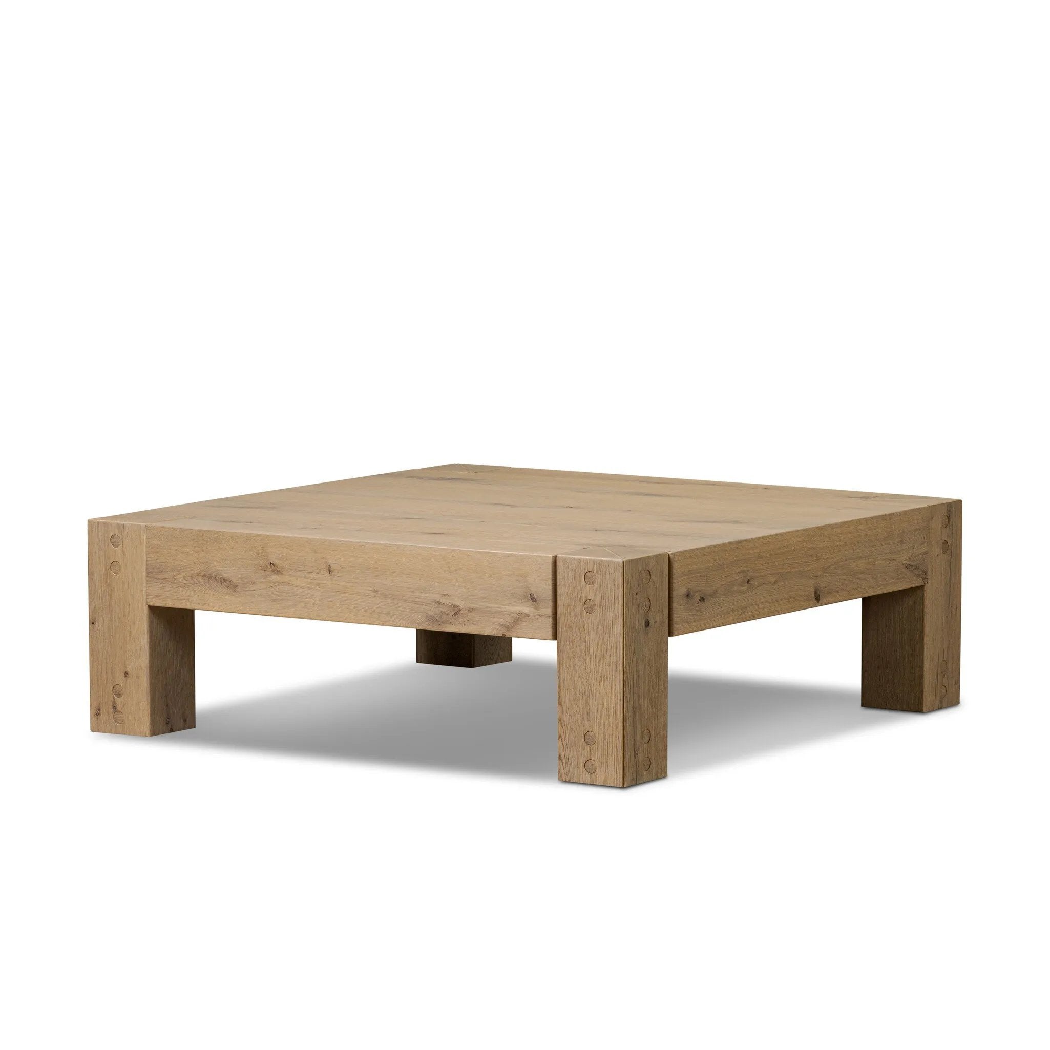 Built from thick-cut oak and veneers with an aged smoked finish, this farmhouse-inspired coffee table features chunky squared legs Amethyst Home provides interior design, new home construction design consulting, vintage area rugs, and lighting in the Dallas metro area.