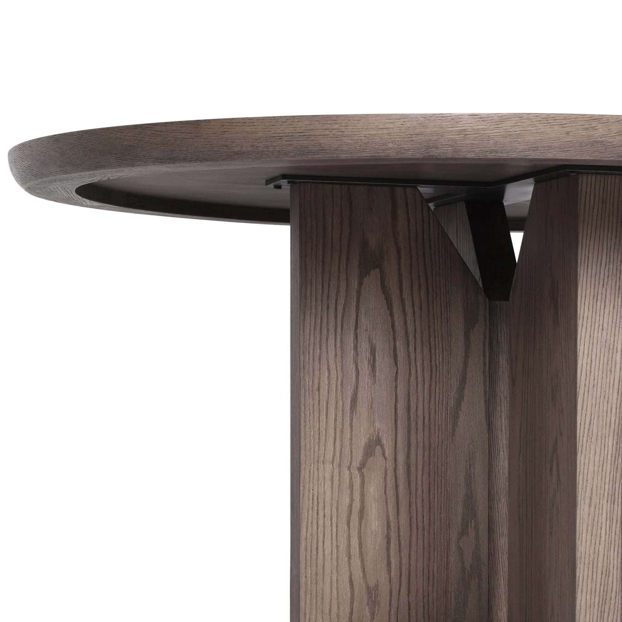 Inspired by minimalist Nordic design, a grey-finished oak dining table has a base of four plinth legs for a simple but impactful detail Amethyst Home provides interior design, new home construction design consulting, vintage area rugs, and lighting in the Austin metro area.