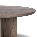 Inspired by minimalist Nordic design, a grey-finished oak dining table has a base of four plinth legs for a simple but impactful detail Amethyst Home provides interior design, new home construction design consulting, vintage area rugs, and lighting in the Charlotte metro area.