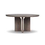 Inspired by minimalist Nordic design, a grey-finished oak dining table has a base of four plinth legs for a simple but impactful detail Amethyst Home provides interior design, new home construction design consulting, vintage area rugs, and lighting in the Houston metro area.